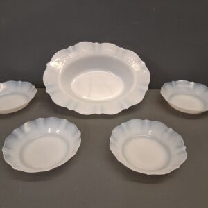 Five Vaseline glass dishes